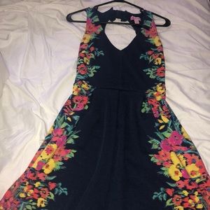 Cute mini dress with flower sides and open back